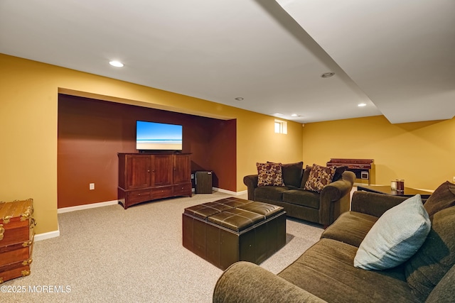 living area featuring baseboards, light colored carpet, and recessed lighting