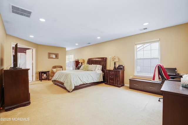 bedroom featuring light carpet, multiple windows, visible vents, and recessed lighting