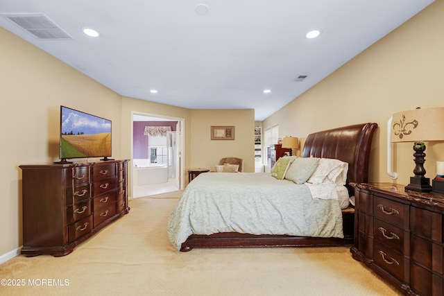 bedroom with multiple windows, visible vents, and recessed lighting