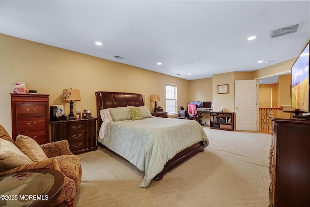 bedroom with recessed lighting, visible vents, and light colored carpet