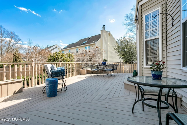 deck featuring outdoor dining space