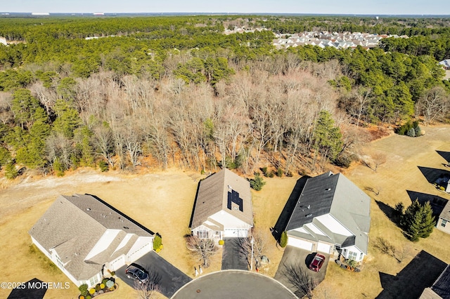 aerial view featuring a view of trees