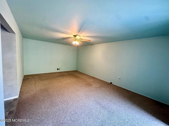 unfurnished room featuring a ceiling fan