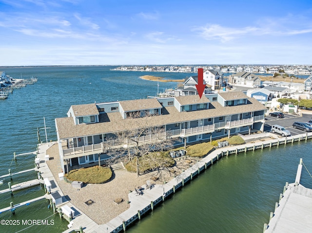 drone / aerial view with a water view