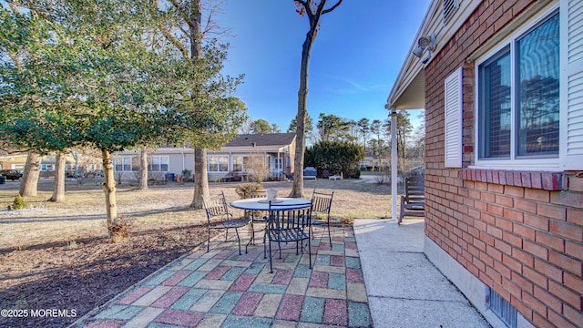 view of patio with outdoor dining area