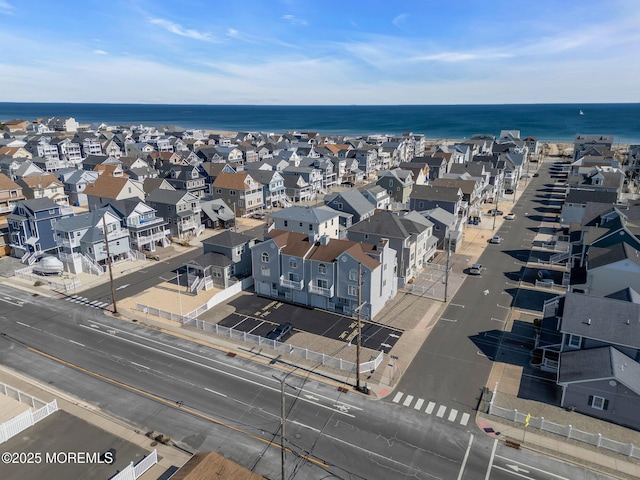 aerial view with a residential view and a water view