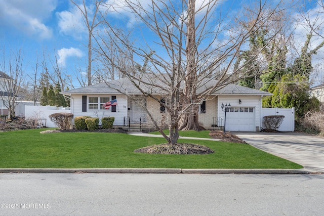 single story home featuring a garage, concrete driveway, a front lawn, and fence