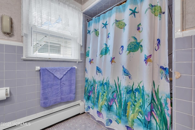 bathroom with baseboard heating, tile walls, and a shower with shower curtain