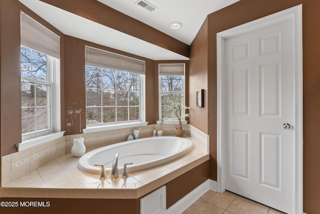 full bath with tile patterned flooring, visible vents, and a bath