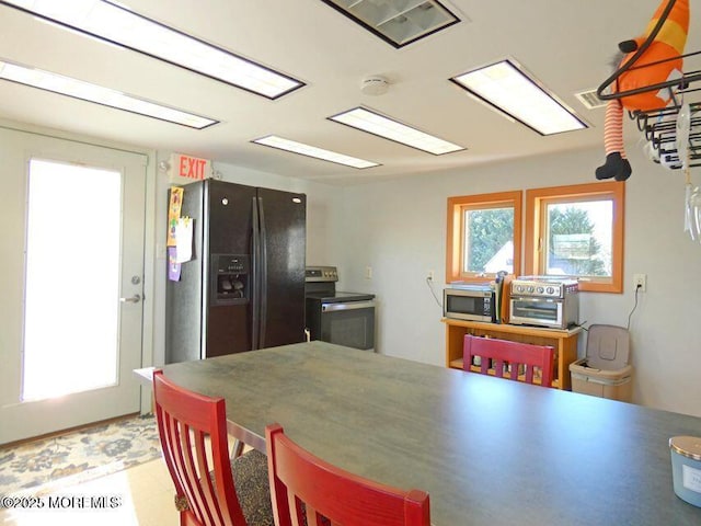 kitchen with stainless steel appliances and a toaster