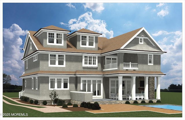 shingle-style home featuring a balcony