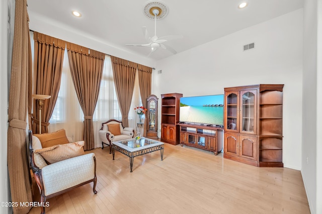 sitting room with light wood finished floors, visible vents, a ceiling fan, and recessed lighting