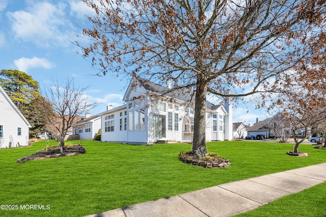 view of front facade with a front lawn