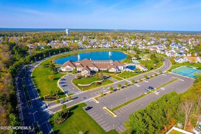 aerial view featuring a water view and a residential view