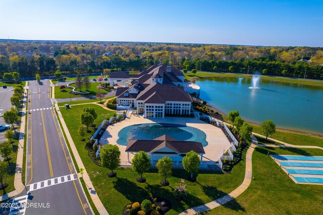 drone / aerial view featuring a water view