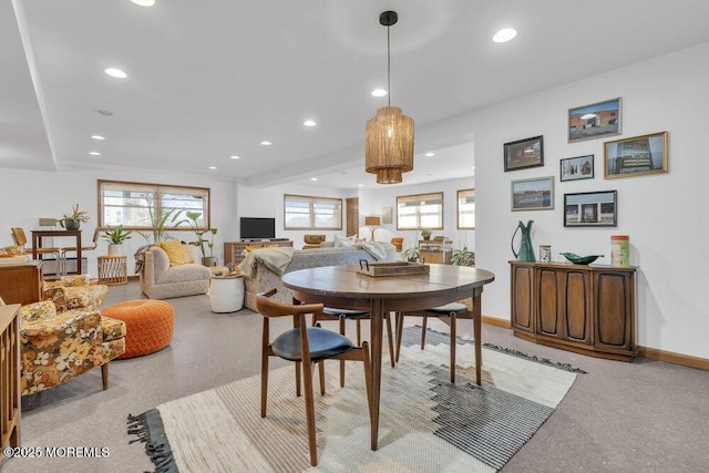 dining space featuring recessed lighting and baseboards