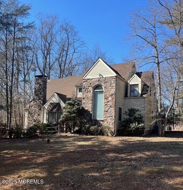 view of front of home featuring stone siding