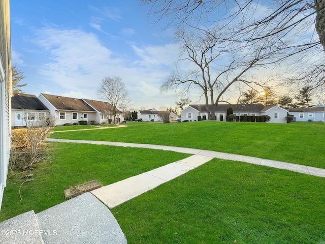 view of yard featuring a residential view