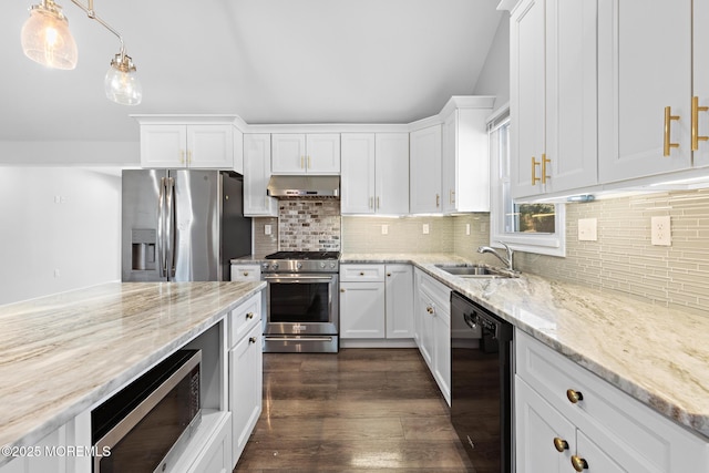 kitchen featuring under cabinet range hood, dark wood-type flooring, a sink, white cabinets, and appliances with stainless steel finishes