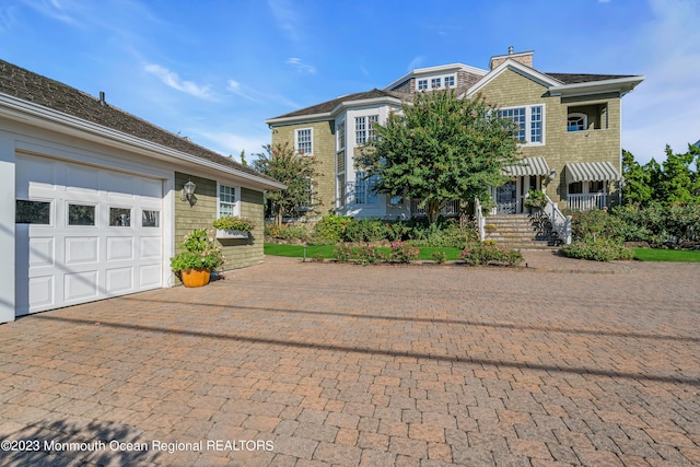 view of front of home featuring a garage