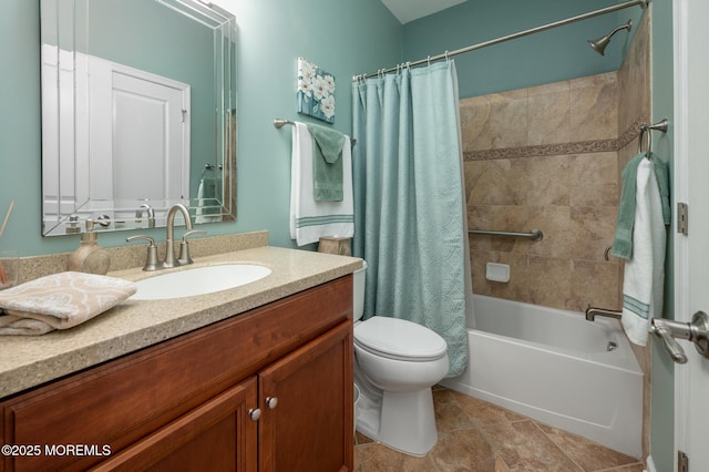 full bath with shower / bath combo, vanity, toilet, and tile patterned floors