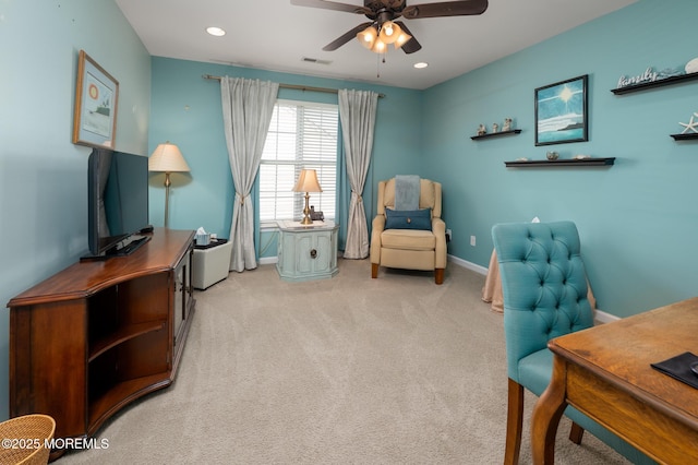 carpeted office space with ceiling fan, visible vents, baseboards, and recessed lighting