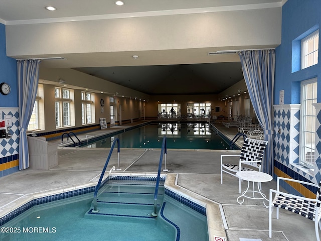 community pool with an indoor hot tub