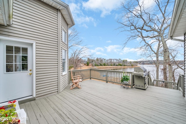 deck featuring a water view