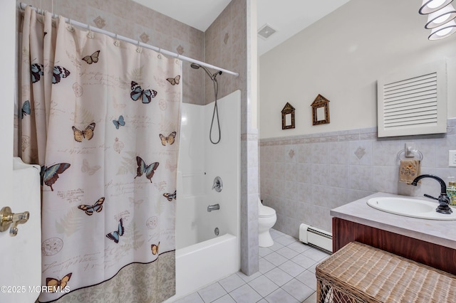 full bathroom featuring visible vents, toilet, tile walls, tile patterned flooring, and baseboard heating
