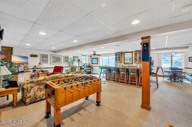 rec room featuring recessed lighting, bar, a paneled ceiling, and ceiling fan