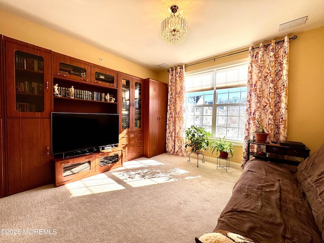 living area featuring light colored carpet