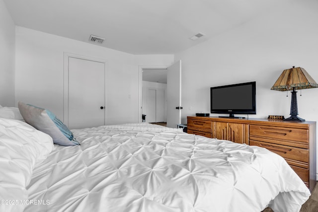 bedroom with visible vents