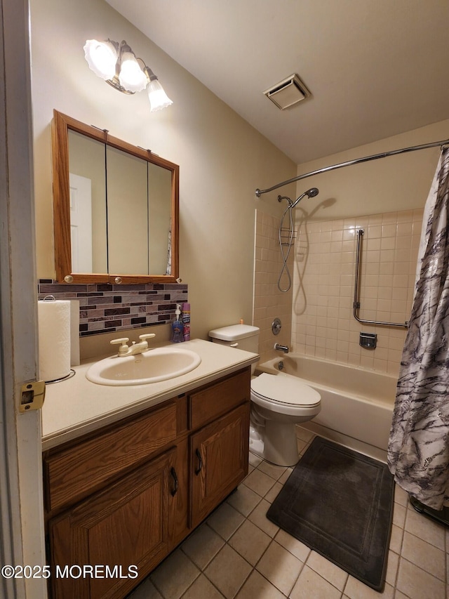 bathroom featuring visible vents, backsplash, shower / bath combo with shower curtain, vanity, and tile patterned floors