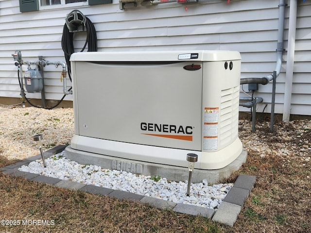 exterior details featuring gas meter and a power unit