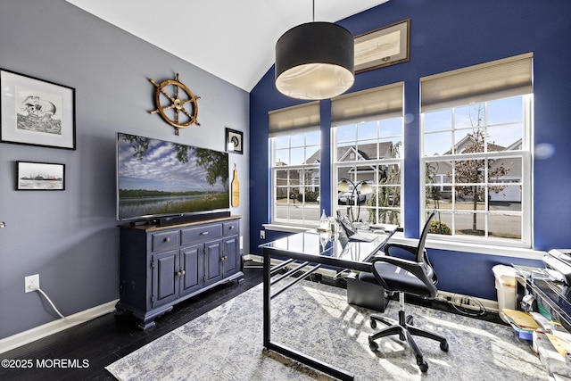 office space featuring vaulted ceiling, dark wood-style flooring, and baseboards