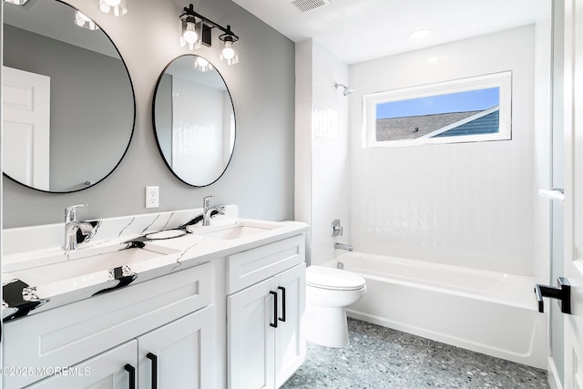 full bathroom with bathtub / shower combination, double vanity, toilet, and a sink