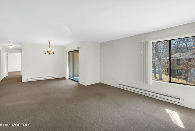 unfurnished room with a baseboard heating unit, an inviting chandelier, and dark colored carpet