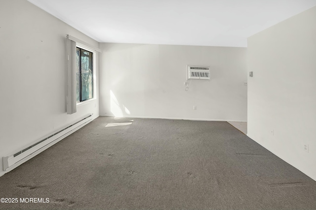 empty room featuring a wall unit AC, carpet, and a baseboard radiator