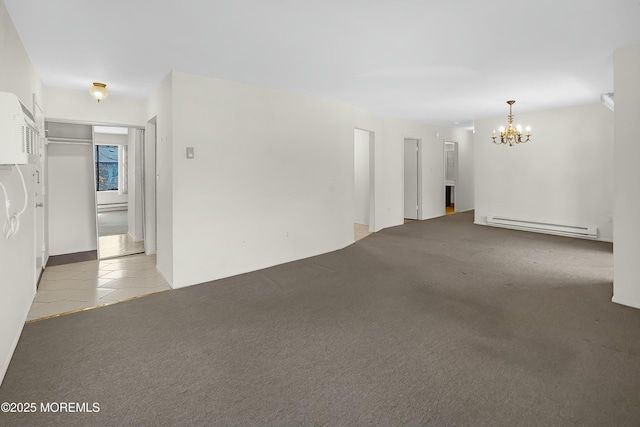 carpeted empty room with tile patterned floors, a notable chandelier, and a baseboard radiator