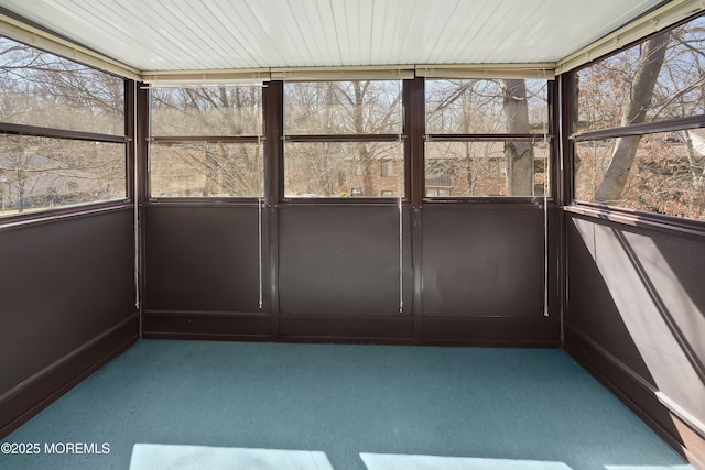 unfurnished sunroom with a healthy amount of sunlight