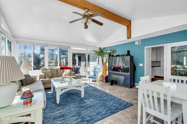 living room with french doors, visible vents, vaulted ceiling with beams, and ceiling fan