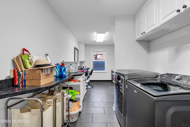 laundry room with cabinet space and independent washer and dryer