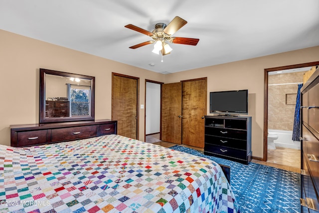 bedroom featuring connected bathroom and ceiling fan