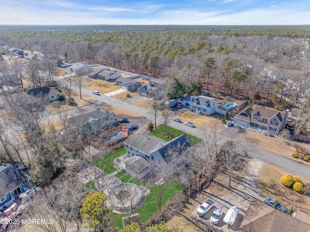 bird's eye view featuring a view of trees