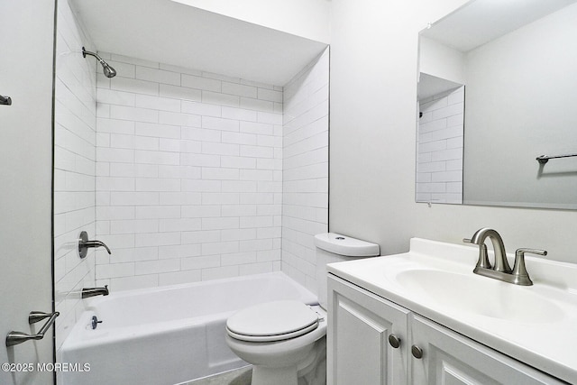 bathroom featuring tub / shower combination, vanity, and toilet