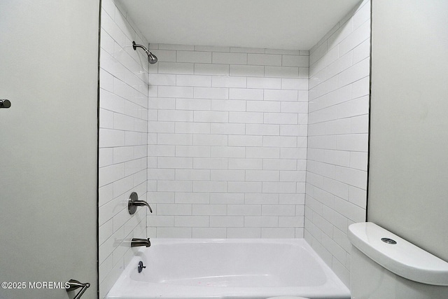 full bathroom with toilet and bathtub / shower combination