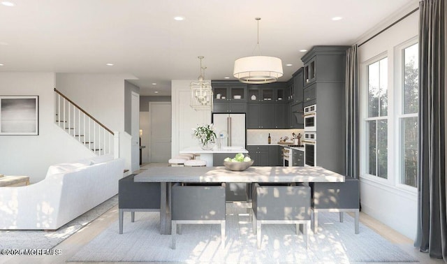 dining area with stairway and recessed lighting