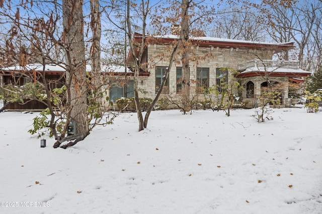 view of front of property featuring stone siding