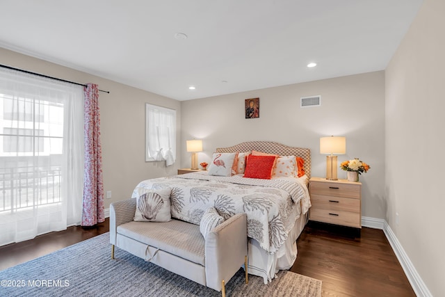 bedroom with wood finished floors, baseboards, visible vents, recessed lighting, and access to exterior