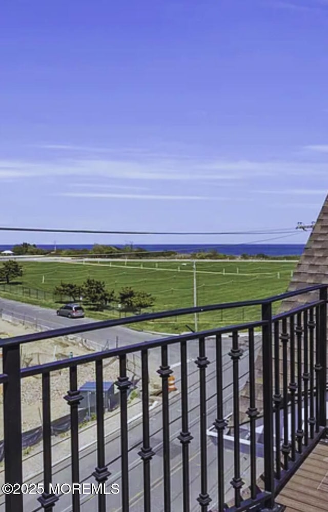 balcony featuring a rural view